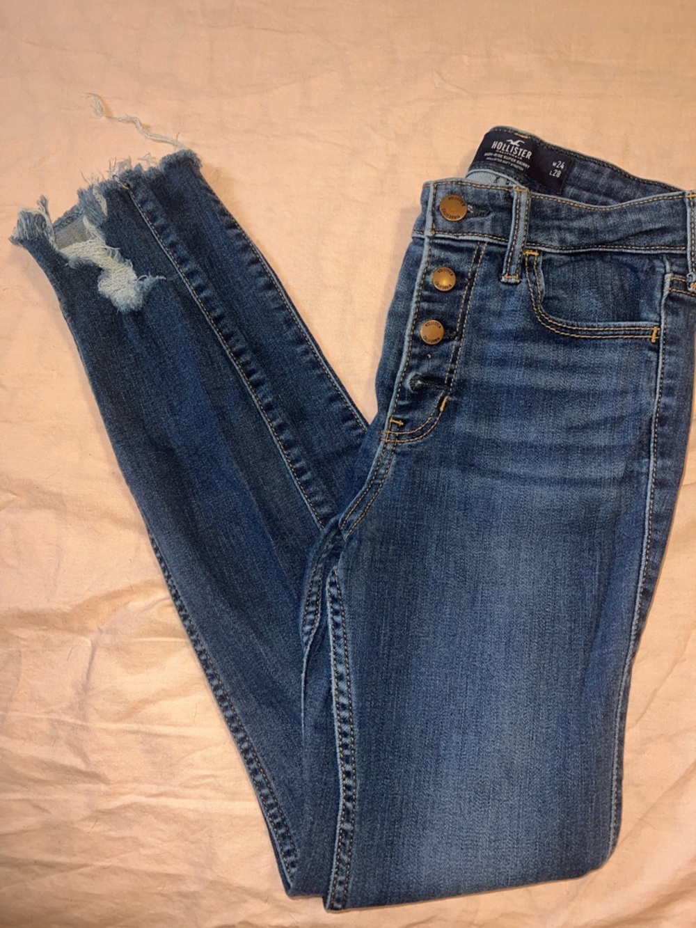 Hollister High-Rise Skinny Jeans w/ Distressed Hem